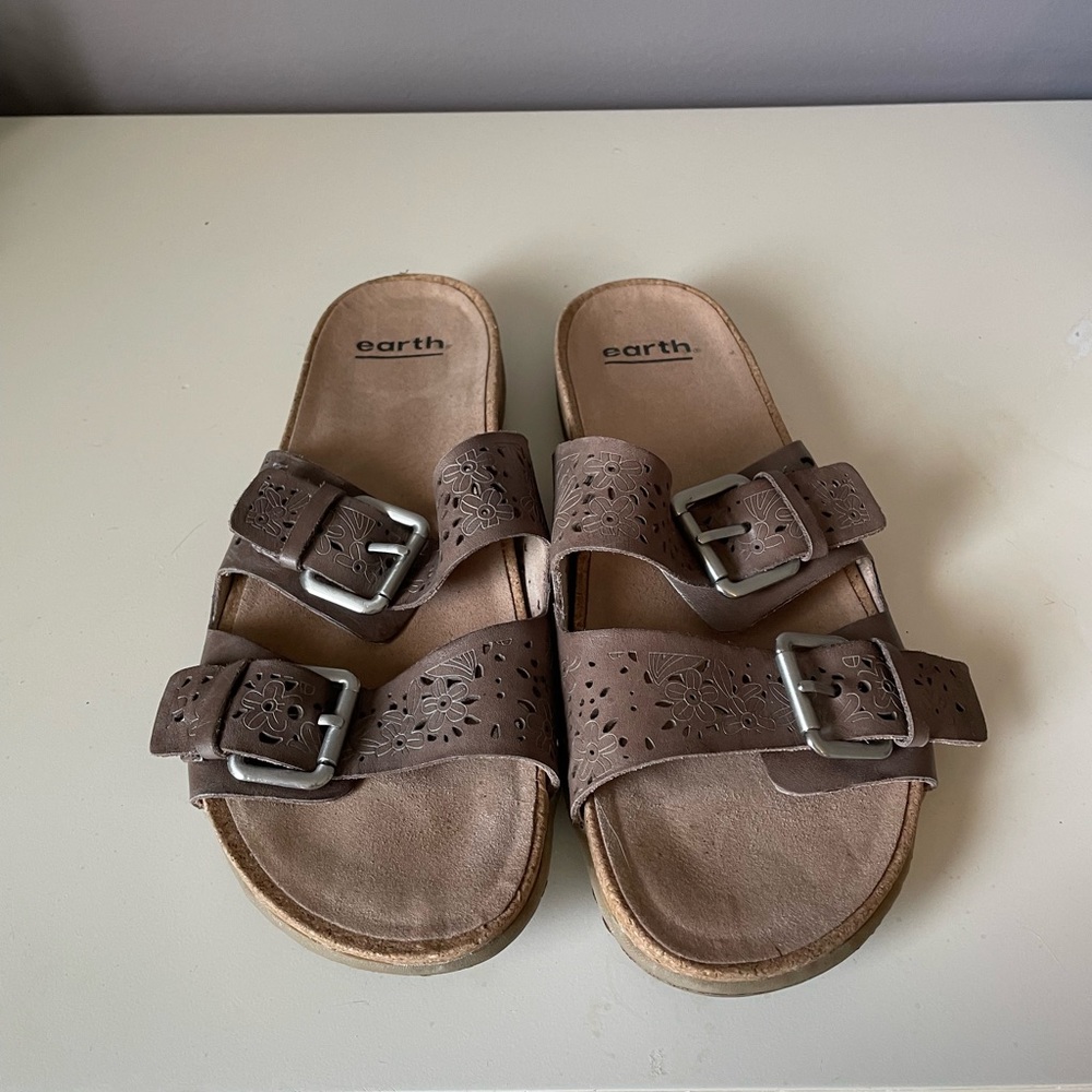 Earth brown leather sandals.